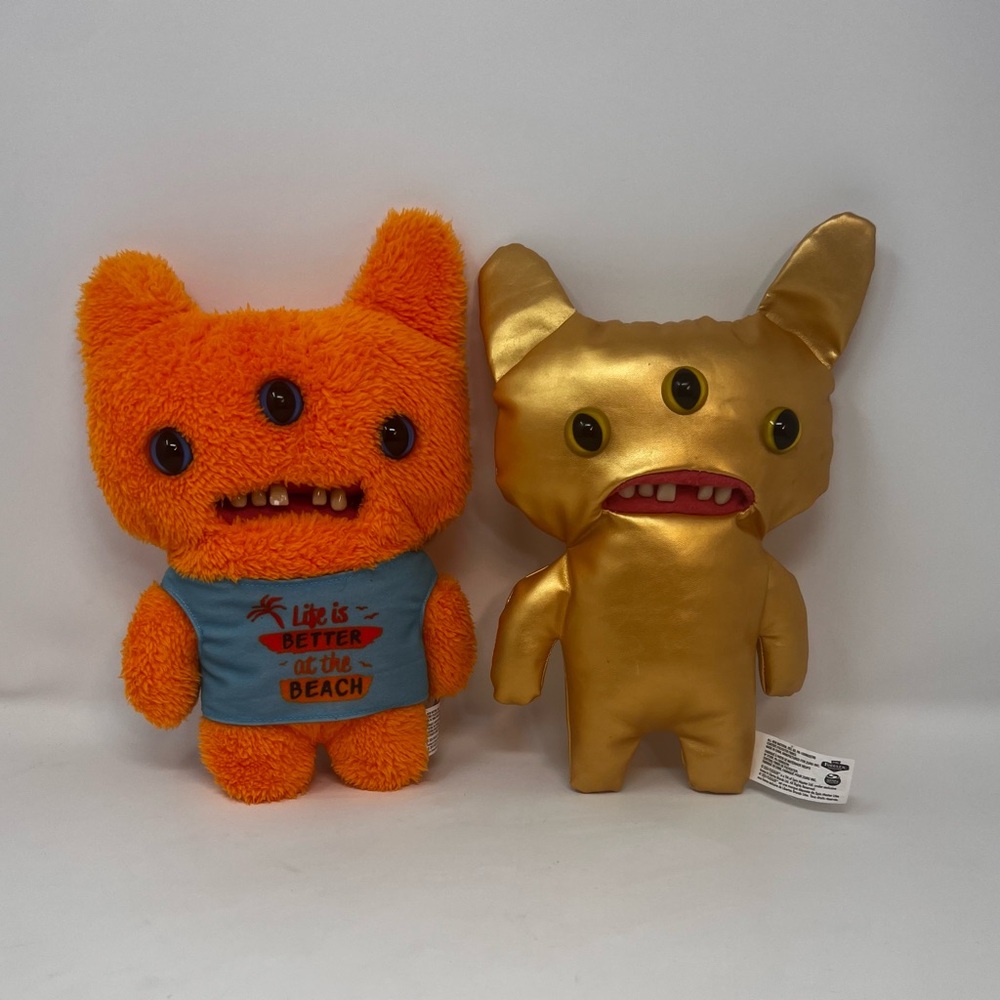 Fuggler Set Of 2 One Gold Shiney One Orange Fuzzy Plush Monsters  Creepy Teeth